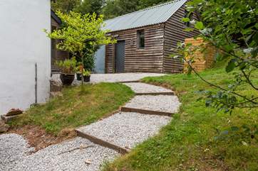 The steps lead up to the front door of Bluebell Barn from the parking area.