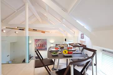 Dine on the mezzanine but do mind your head on the beams.
