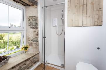 The shower-room boasts a lovely shower, perfect for washing away sand and sea hair.