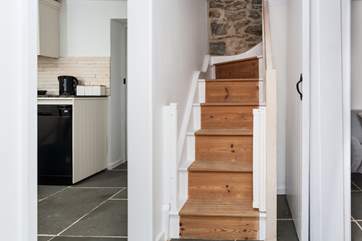 The staircase at Parc Place is true to Cornish Cottage Character and is narrow and a little steep. It also has a low beam, so mind you're head in places. There is a balustrade one side but no handrail due to limited space.