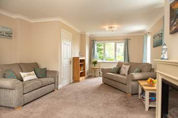 The sitting-room is light and airy and a place for all to gather.
