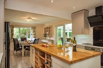 The kitchen/dining-room leads out to the conservatory.