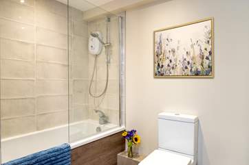 The family bathroom also has a shower over the bath.