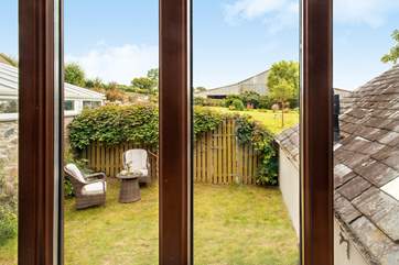 The small enclosed garden, that is accessed from the twin bedroom, is a lovely spot to enjoy morning coffee.