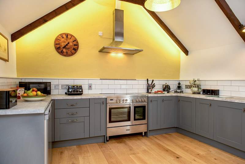The modern kitchen has a range-style cooker which will delight the chefs amongst you.