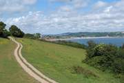 The World Heritage Jurassic Coast is just a five mile drive away, stretching through east Devon and over the border at Lyme Regis into Dorset. Seaton, the nearest beach, is in the distance.