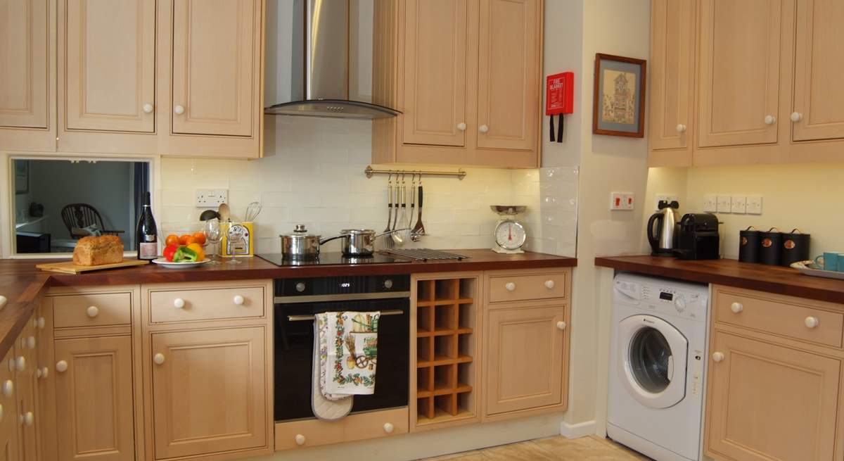 The kitchen is well-equipped and offers plenty of space. 