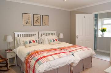 Another view of this lovely spacious bedroom with the en suite shower-room.