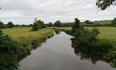 This is the river Axe. You cross the river to reach the Coach House and there are footpaths all along the banks. - Thumbnail Image