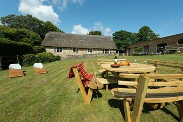 The owner's outbuildings are to one side of the farmyard.
