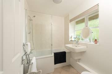 The bathroom is on the ground floor and offers a bath as well as a fitted shower.