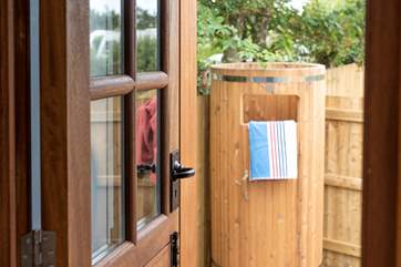The outside shower is perfect for washing salt and sand away after a day at the beach.