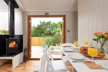 Double doors lead out to the gravelled patio area.