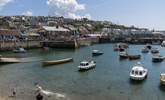 Enjoy a day or evening out in Porthleven. Watch the boats 'bobbing' about in the harbour, and then enjoy a lunch or dinner in one of the harbour restaurants.  - Thumbnail Image