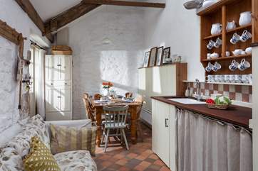 Plenty of room around the dining-table for the whole family.