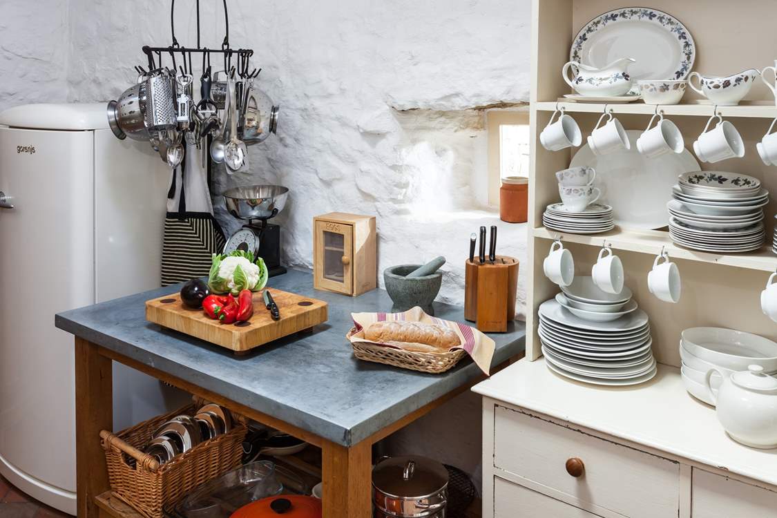 There are lots of little 'cottage' touches throughout, like this cute crockery set.