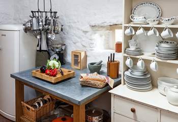 There are lots of little 'cottage' touches throughout, like this cute crockery set. 