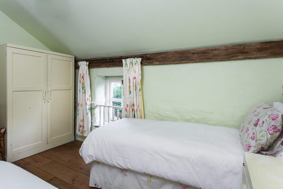 Bedroom 4 is as pretty as a picture.