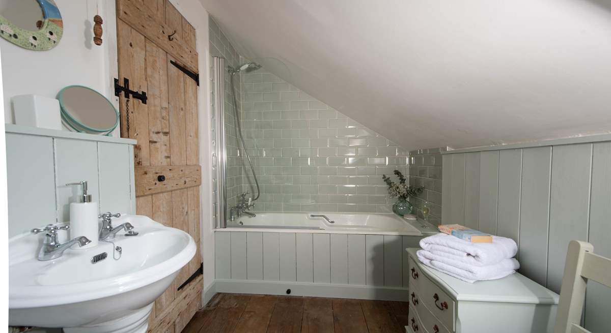 The cottage-style family bathroom.