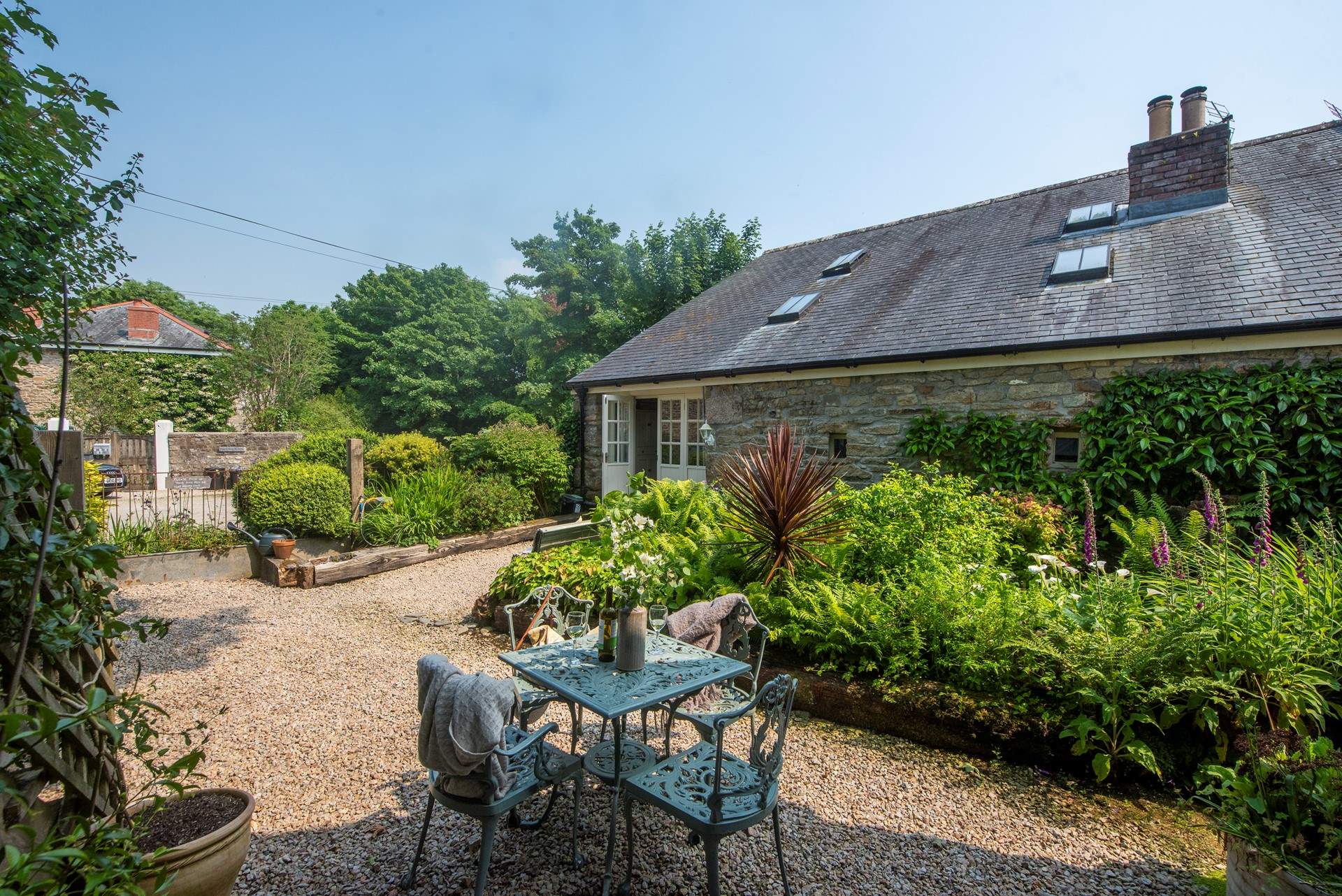The pretty courtyard at the front of Primrose Cottage, a perfect spot to either start or end  your day. 