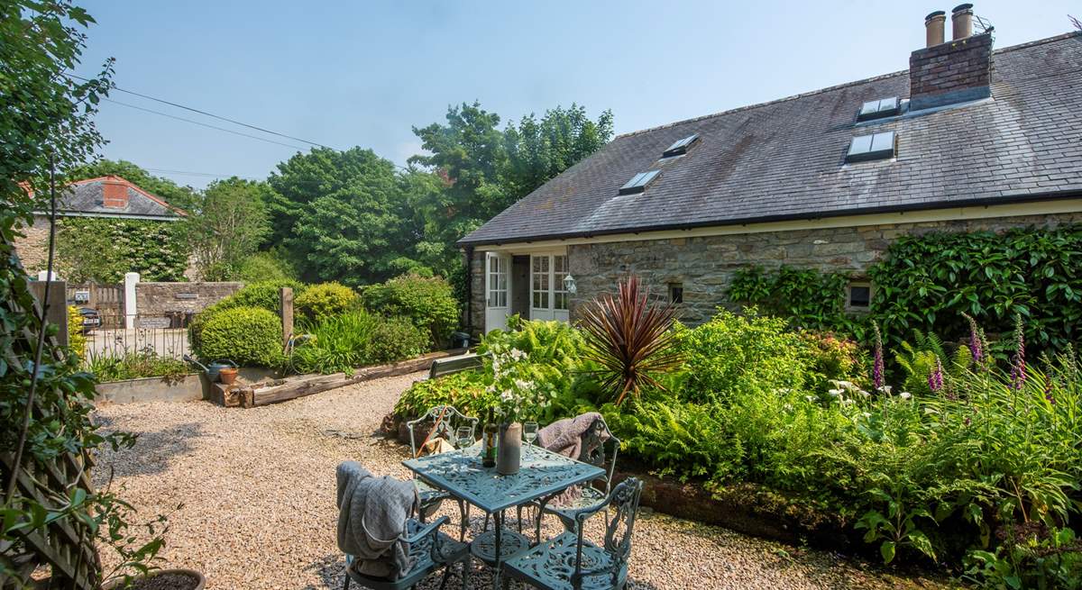 The pretty courtyard at the front of Primrose Cottage, a perfect spot to either start or end  your day. 