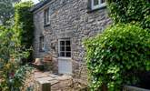 What a lovely spot for a morning coffee! The rear courtyard is accessed by the stable door leading out from the lounge area.  - Thumbnail Image