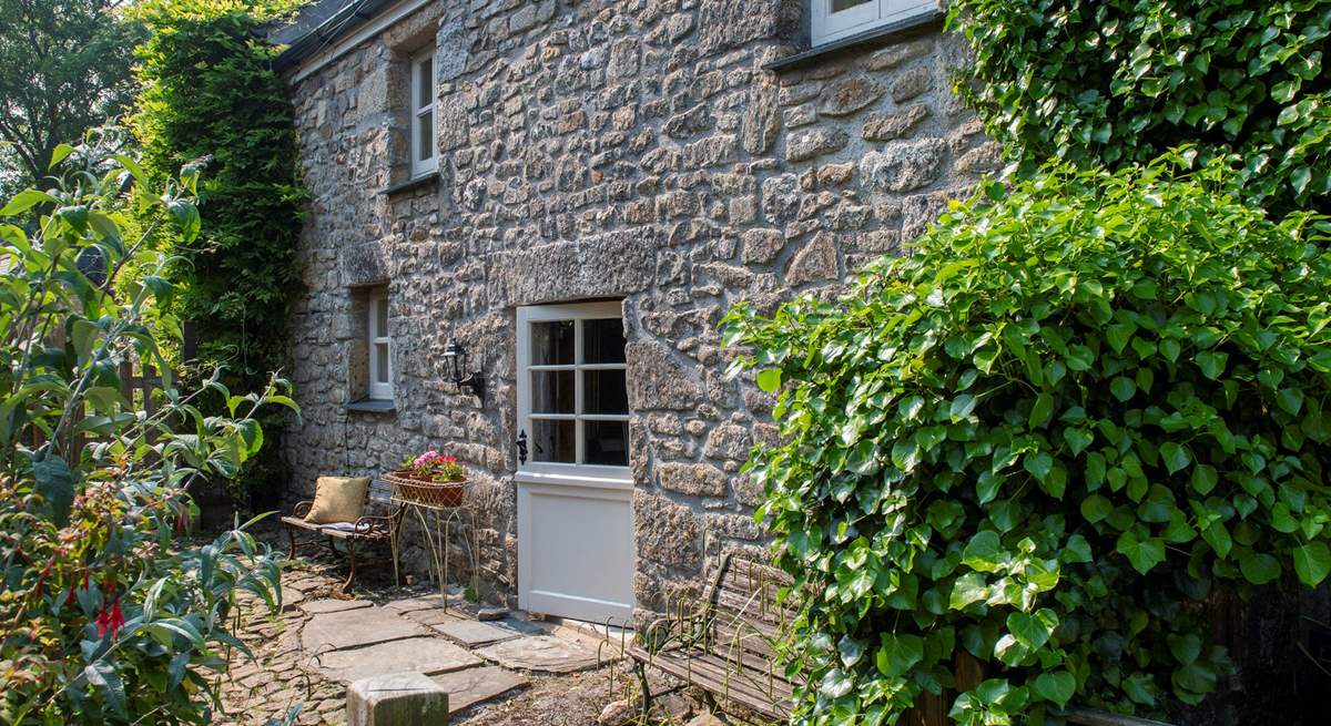 What a lovely spot for a morning coffee! The rear courtyard is accessed by the stable door leading out from the lounge area. 