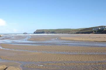 The golden sands at Polzeath - a favourite with surfers and families alike.
