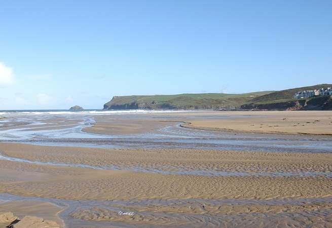 The golden sands at Polzeath - a favourite with surfers and families alike.