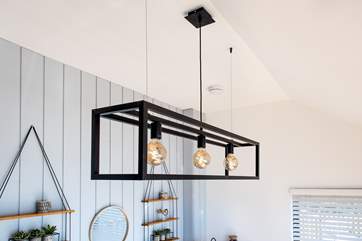 The striking light fitting in the sitting area.