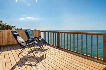 Sit back and relax with the sea glistening in front of you - bliss!