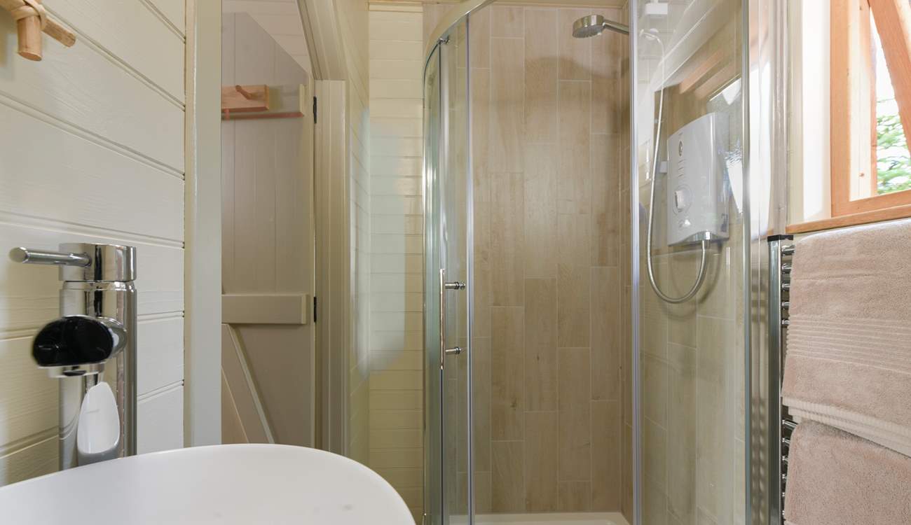 Complete with shower cubicle.