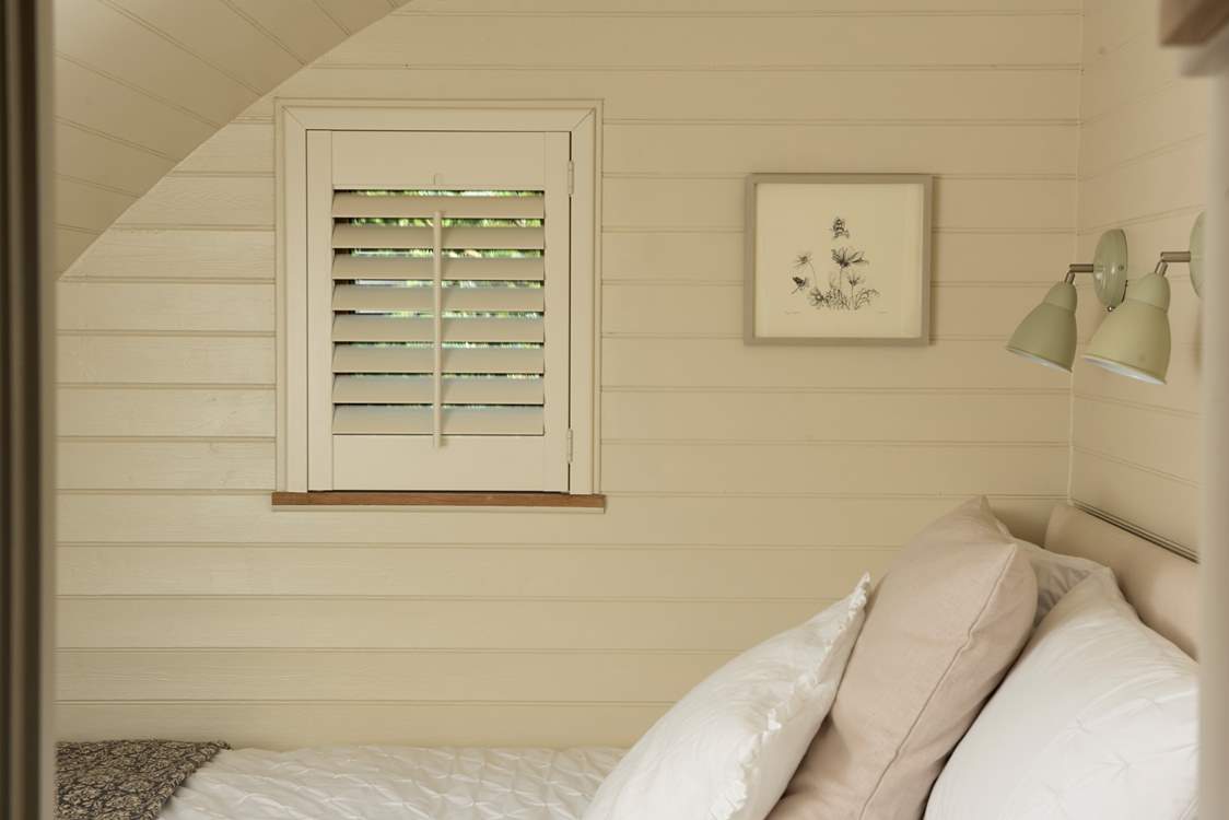 Pretty artwork and soft tones create a calm and cosy feel.