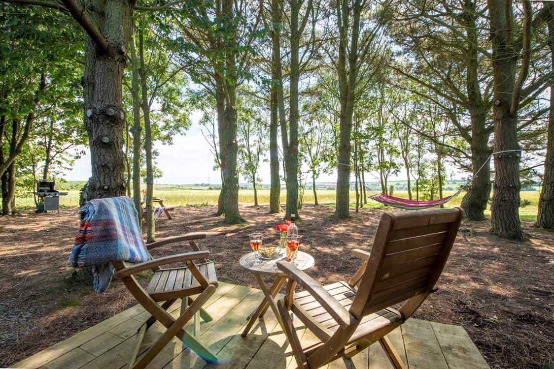 Whilst enjoying the far-reaching views and magical woodland setting.