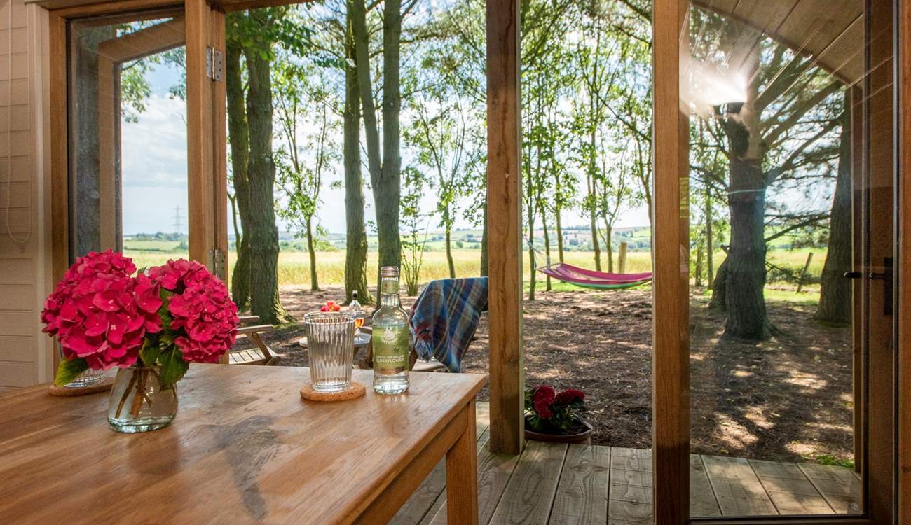 Double doors look out onto the gorgeous view.
