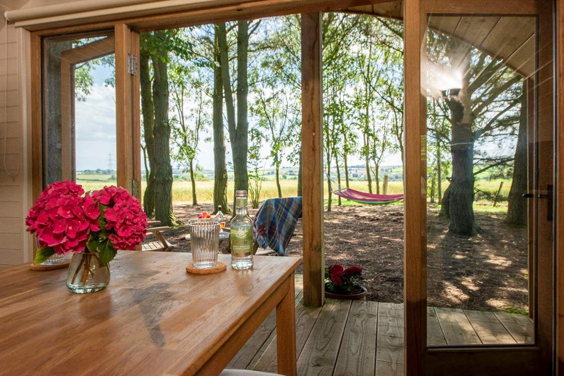 Double doors look out onto the gorgeous view.