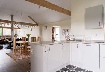 The open place space creates such a social set-up, especially with the double-sided wood burner at its heart