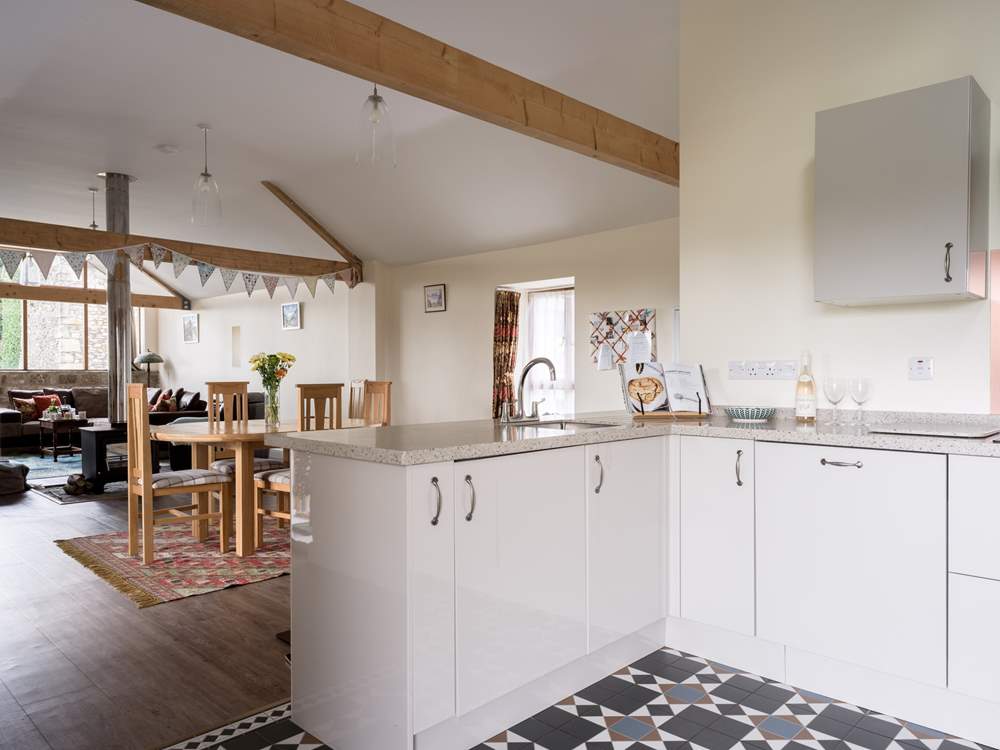 The open place space creates such a social set-up, especially with the double-sided wood burner at its heart