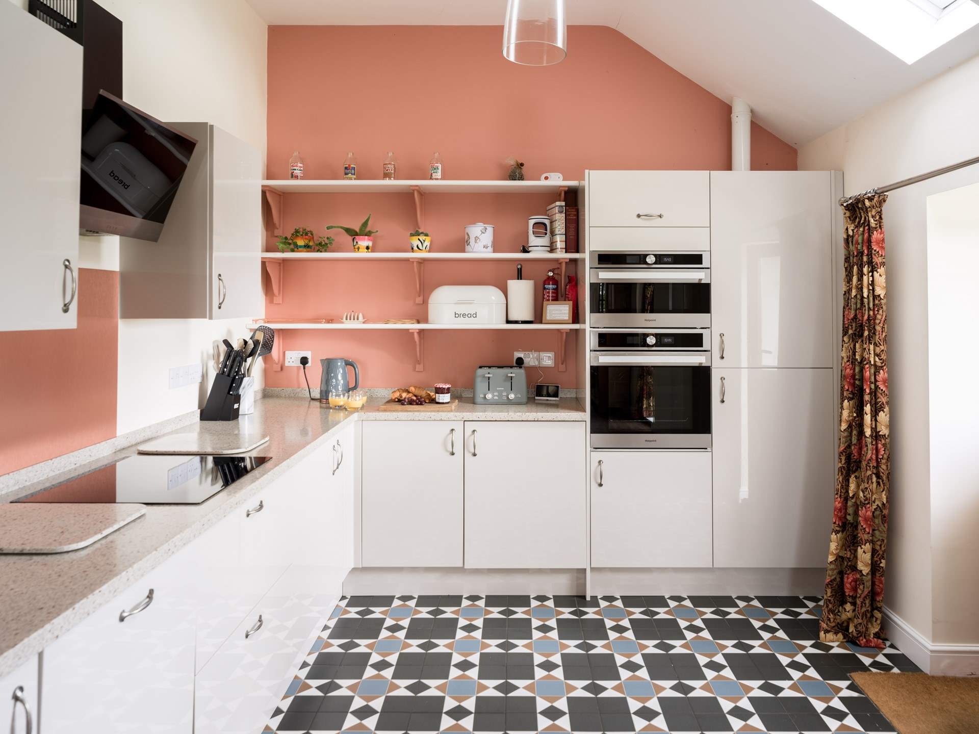 The modern kitchen is well thought out with lots of prep space and all the expected appliances