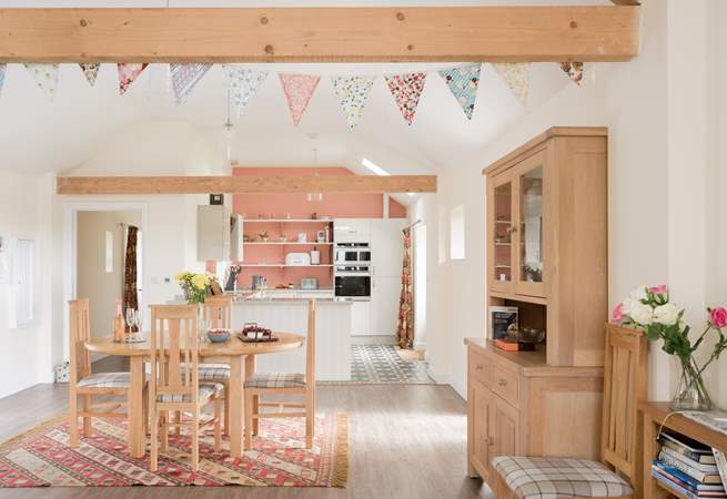 The open plan theme goes on into the beautiful kitchen