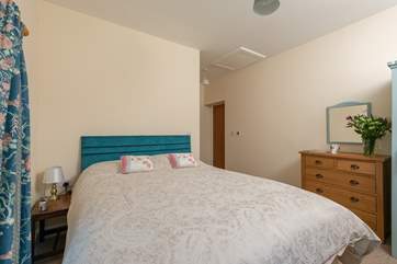 Another view of the master bedroom. There is plenty of storage and plenty of space.