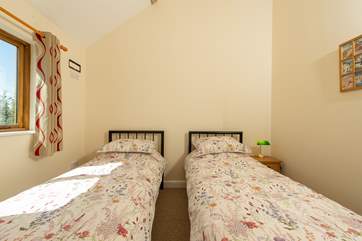 Another shot of the twin bedroom. The tall ceiling gives a wonderful airy feel to this room.