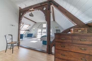 The master bedroom on the second floor has a separate dressing area...