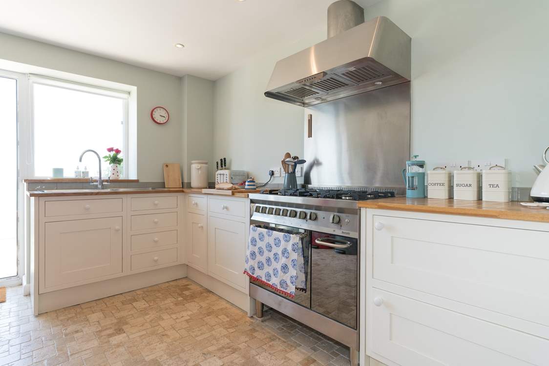 With an open plan living-room with kitchen and dining areas this property has a very sociable feel.