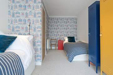 On the first floor you will find a twin bedroom...