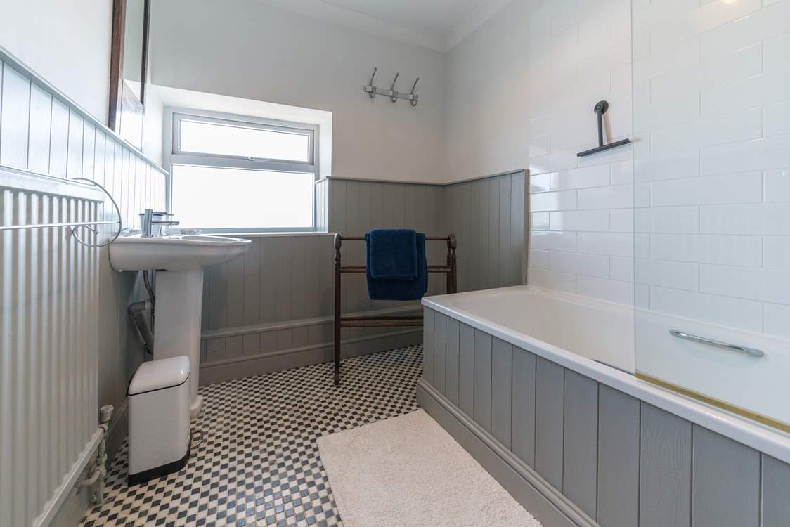 The first floor bathroom with fitted shower...