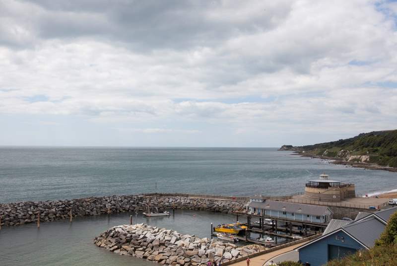 Ventnor seafront with its cafes and restaurants serving locally caught seafood.