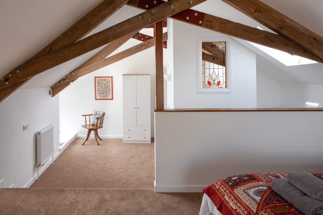 There is a step down onto the lower tier of the bedroom which leads you to the en suite.