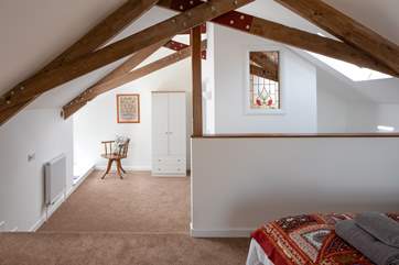 There is a step down onto the lower tier of the bedroom which leads you to the en suite.