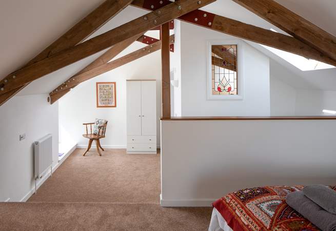 There is a step down onto the lower tier of the bedroom which leads you to the en suite.